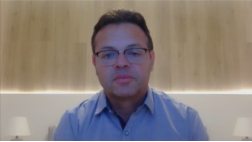A person wearing glassesDescription automatically generated